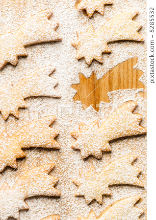 Christmas sweets comet star with powdered sugar Christmas sweets comet star with powdered sugar 8285532