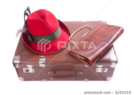 Vintage suitcase with clutch bag and traditional Bavarian hat 8285819