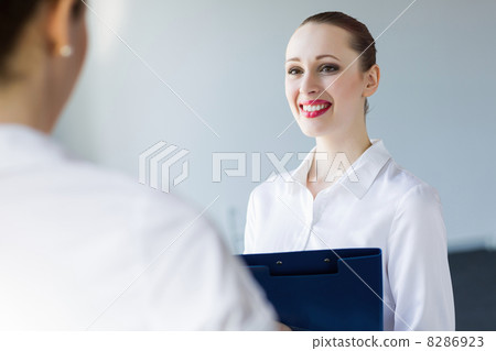 Businesswoman with colleague 8286923