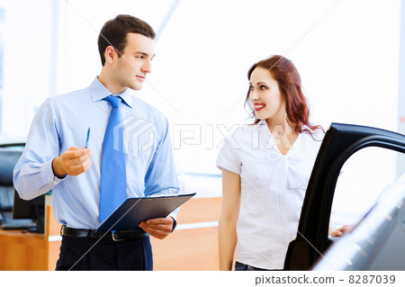 Young woman at car salon 8287039