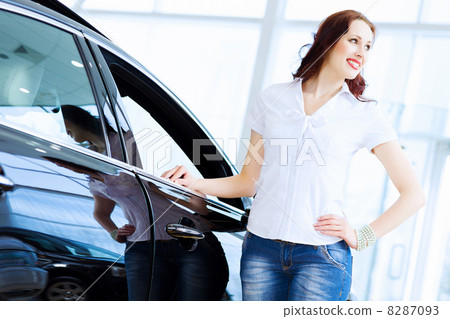 Young lady at car salon Young lady at car salon 8287093