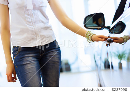 Young lady at car salon 8287098
