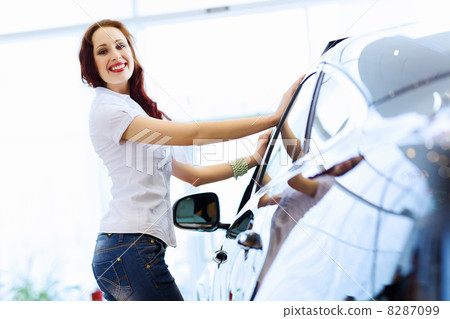 Young lady at car salon 8287099