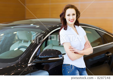 Young lady at car salon Young lady at car salon 8287148