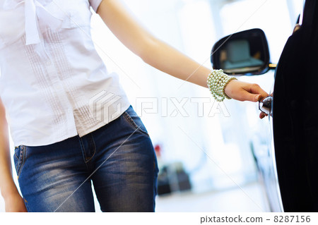 Young lady at car salon 8287156