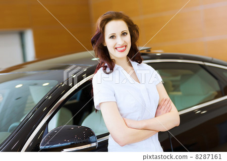 Young lady at car salon Young lady at car salon 8287161