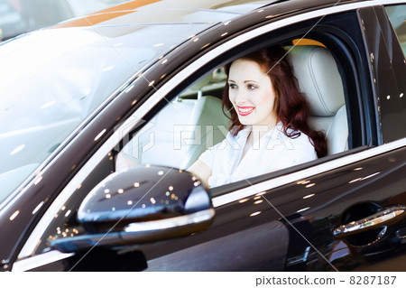 Young woman in car Young woman in car 8287187