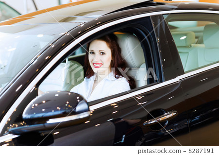 Young woman in car Young woman in car 8287191