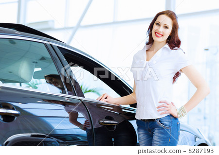 Young lady at car salon Young lady at car salon 8287193