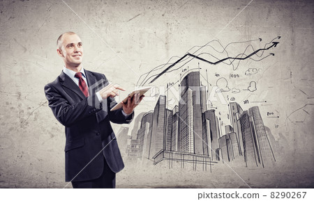 Businessman with ipad Businessman with ipad 8290267