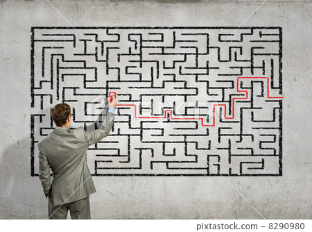 Businessman solving labyrinth problem Businessman solving labyrinth problem 8290980