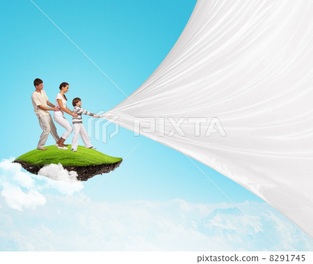 Young family pulling banner Young family pulling banner 8291745