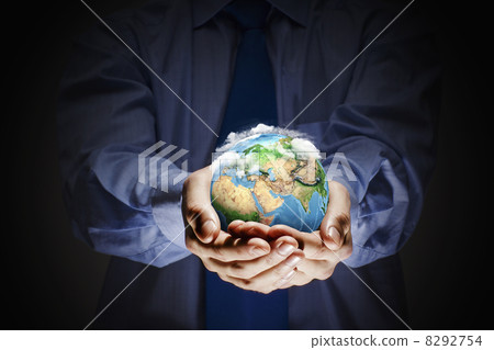 Earth planet in hands 8292754