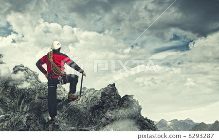 Young tourist atop of mountain 8293287