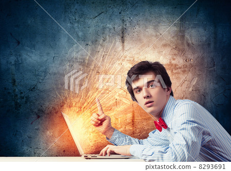 Businessman using laptop 8293691