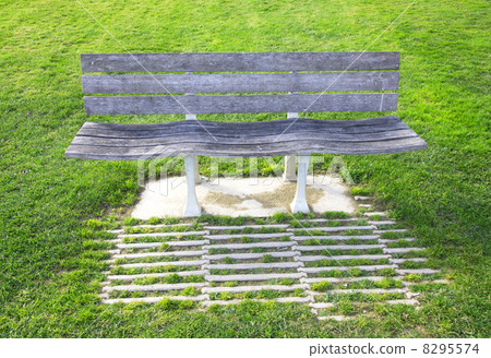 Portugal. Bench in a lawn 8295574