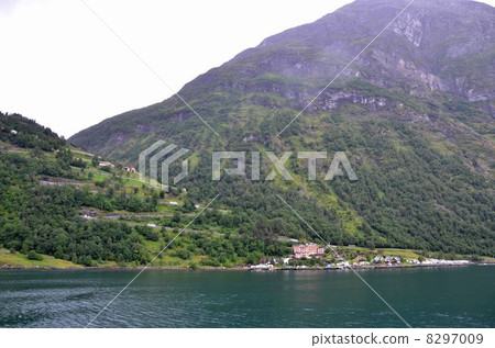 World heritage Eagle Road going into the cliff of the Geiranger Fjord 8297009