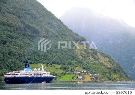 A calm world heritage Geiranger Fjord where a cruise ship berries A calm world heritage Geiranger Fjord where a cruise ship berries 8297010