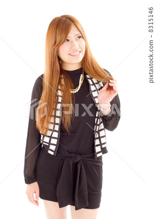 Pretty Japanese girls posing with looking up diagonally while touching their hair Pretty Japanese girls posing with looking up diagonally while touching their hair 8315146