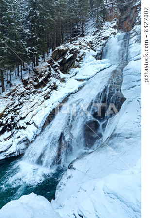 Alps waterfall winter view 8327002