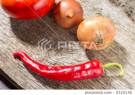 Vegetables on rustic wooden background 8328136
