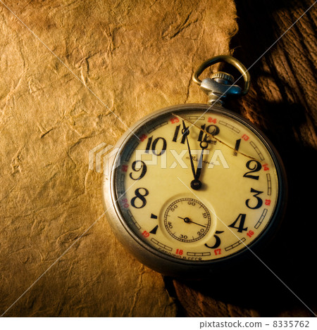 Old Clock and paper 8335762