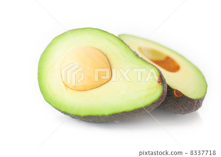 two halves of avocado isolated on white two halves of avocado isolated on white 8337718