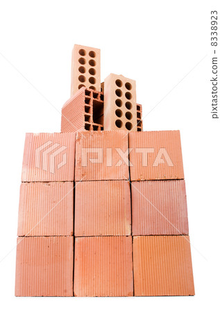 Stack of clay bricks isolated on white Stack of clay bricks isolated on white 8338923