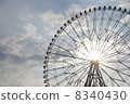 Ferris wheel and sky 8340430