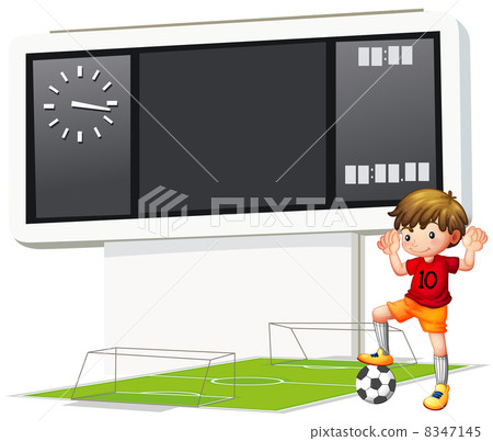 A boy playing soccer at the court A boy playing soccer at the court 8347145