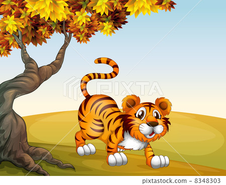 A tiger in a jumping position near the big tree 8348303