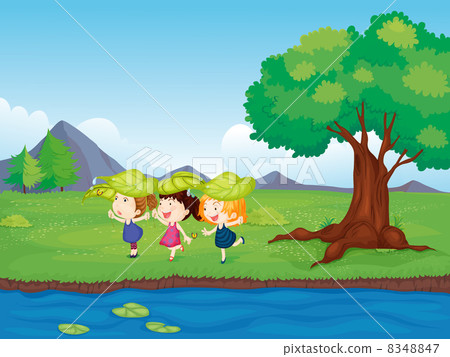 Three girls playing beside the pond 8348847