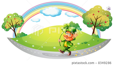 A man in the street holding a clover plant A man in the street holding a clover plant 8349286