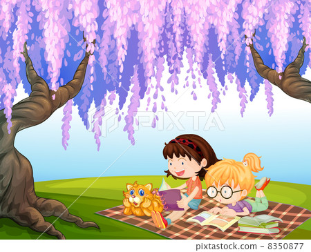 Girls reading at the park with a cat Girls reading at the park with a cat 8350877