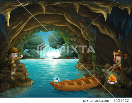A young girl and boy inside the cave 8351462