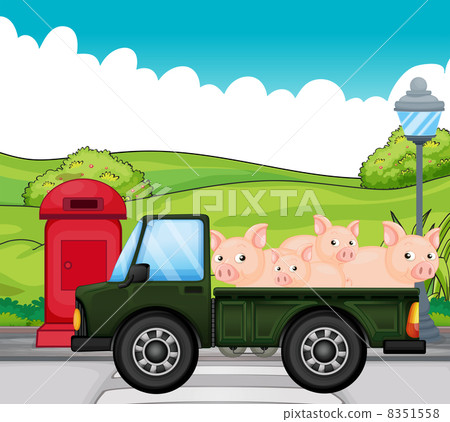 A green vehicle with pigs at the back A green vehicle with pigs at the back 8351558