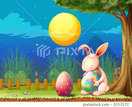 A bunny in the fence with two easter eggs A bunny in the fence with two easter eggs 8353572