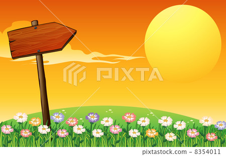 A sunset with a wooden arrow A sunset with a wooden arrow 8354011