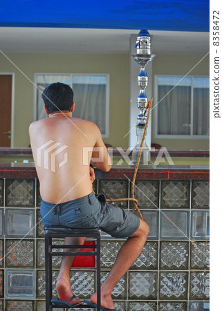 Water cigarette smoking tool water smoke pipe Islamic area cafe bar bar pool bar enthusiast male person lightened tropical hot flavor Shisha Hooker Nargire Bali Bali Indonesia Southeast Asian break relax 8358472