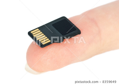 Tiny flash memory card on fingertip 8359649