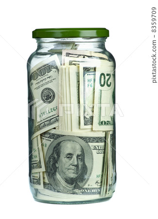 Dollars "conserved" in glass jar 8359709