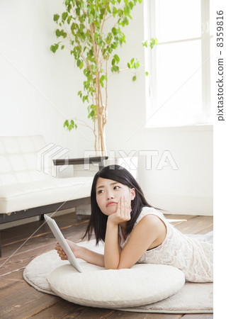 Girls using tablets Girls using tablets 8359816