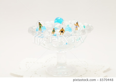 Swimming at the beach at the glass Swimming at the beach at the glass 8370448