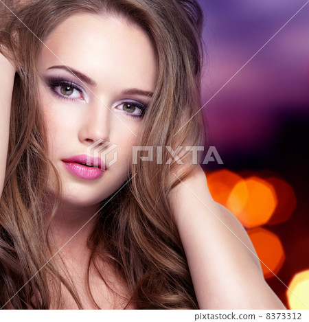 Portrait of girl with pretty face with long hairs 8373312