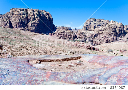 multicolored stone dessert in Petra valley, Jordan multicolored stone dessert in Petra valley, Jordan 8374087