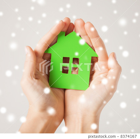 woman hands holding green house 8374167