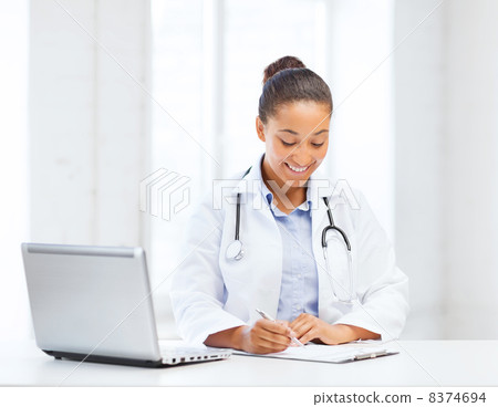 female doctor with laptop pc female doctor with laptop pc 8374694