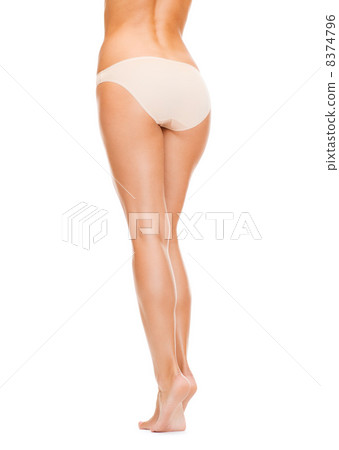woman with long legs in cotton underwear woman with long legs in cotton underwear 8374796