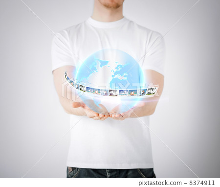 man with virtual globe and news man with virtual globe and news 8374911