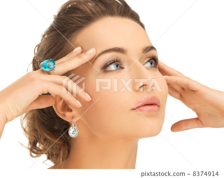 woman with blue cocktail ring woman with blue cocktail ring 8374914
